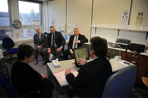 Members of the Welfare Reform Committee watch a demonstration of a work-capability assessment at Atos Healthcare, Edinburgh. Left to right, Kevin Stewart MSP, Alex Johnstone MSP and Committee Convener Michael McMahon MSP